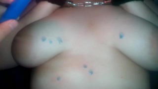 The handcuffed girl gets a portion of candle wax on her body.