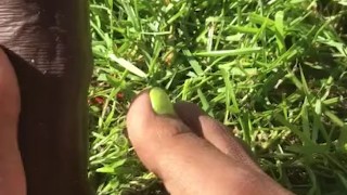 Singing toes on uncut dildo