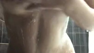 Petite Latina has soapy fun in shower ;)