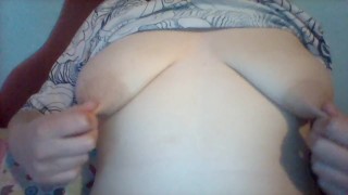 Tugging and twisting my aching nipples