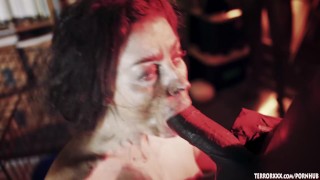 Caged Sovereign Syre sucking a big black cock