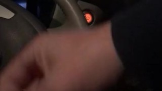 Stroking soft white cock in electric car POV
