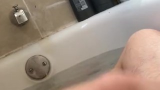 White Cock stroking in the bath tub with baby oil POV