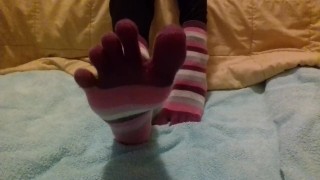 Spreading my toes and showing you my feet and soles in toe socks