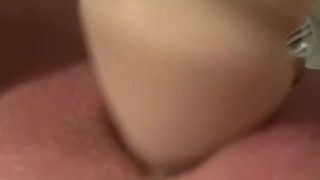 Masturbates to huge cock and orgasms hard on it