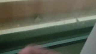 Shemale Cumming in Casino Window while Watching Workers Make Her Omlet