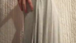 This guy wears a Long White Dress