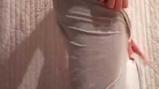 This guy wears a Long White Dress