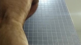 Self fisting in public showers: hot man gets naughty when nobody's around