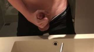 Blasting a load on hotel mirror