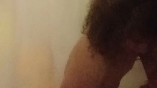 Fingering ass and stroking in shower