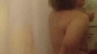 Fingering ass and stroking in shower