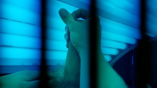 Watch me tense up as i cum on myself in this tanning bed