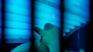 Watch me tense up as i cum on myself in this tanning bed