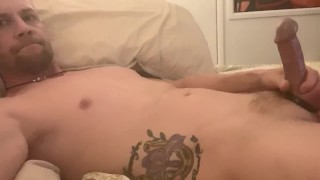 Jock plays with his cut cock