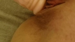 Girl orgasms alone with strap on