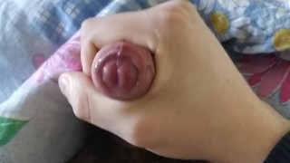 Teen jerks off and cums on belly