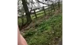 Risky naked walk down a lane