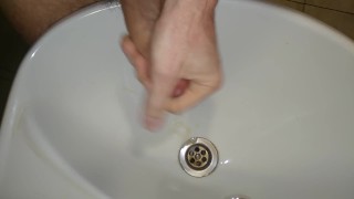 cumshot in the public toilet