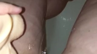 Cute bbw pissing on dildo in shower