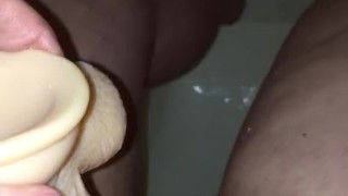 Cute bbw pissing on dildo in shower