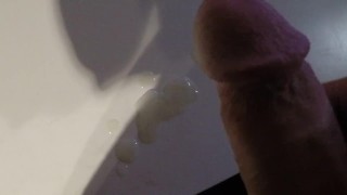 Jerking off on the table closeup
