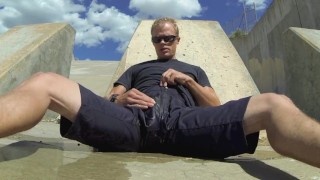Pissing black athletic shorts in public and cumming inside them