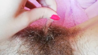 Playing with my big clit hood pulling and stretching hairy bush pussy close