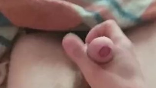 Masturbating