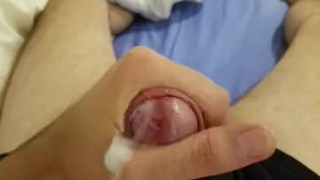 Young guy sprays a lot of cum