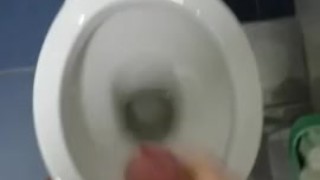 Spraying the toilet seat.