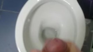 Spraying the bathroom floor.