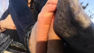 public footjob and socks job from beauty on in the Park. Close view