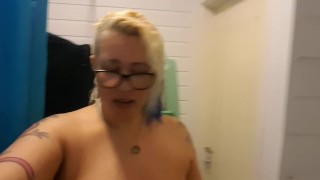 tattooed blonde MILF with big tits orders man to drink her spit and piss