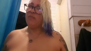 tattooed blonde MILF with big tits orders man to drink her spit and piss