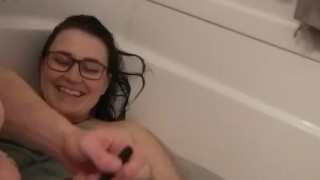Smiley milkymama gets groomed by a fan in bathtub