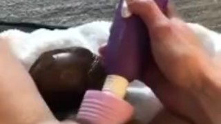 Wife pleasing herself with big black dildo while husband is at work