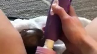 Wife pleasing herself with big black dildo while husband is at work