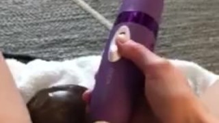 Wife pleasing herself with big black dildo while husband is at work