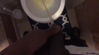 Black guy pees