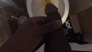 Black guy pees