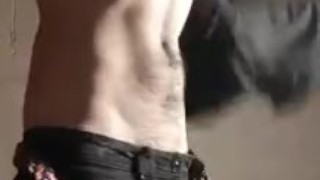 Standing, undressing and pulling cock Fire Boy