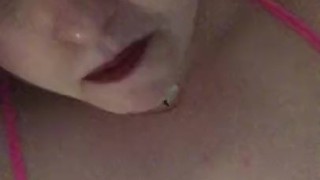 Sucking a ridged dildo in lingerie