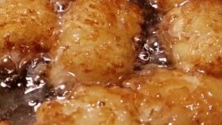 Greasy nasty lil tater tots in hot oil bath FOODPORN