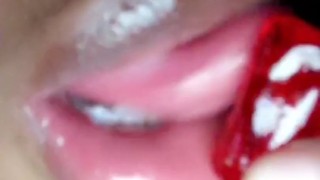 LOOK! She’s on the CANDY with her TONGUE
