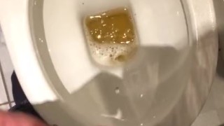 Young twink pissing