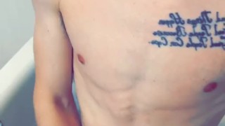 Guy gets wet in the bath