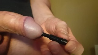 deep cock sounding close up