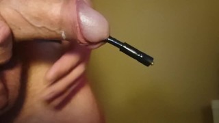 deep cock sounding close up