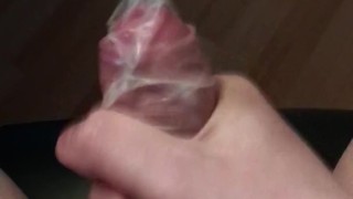 Putting on a condom, and cumming inside a condom with dirty talk (cumshot)